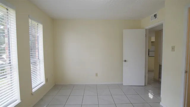 a view of an empty room with window