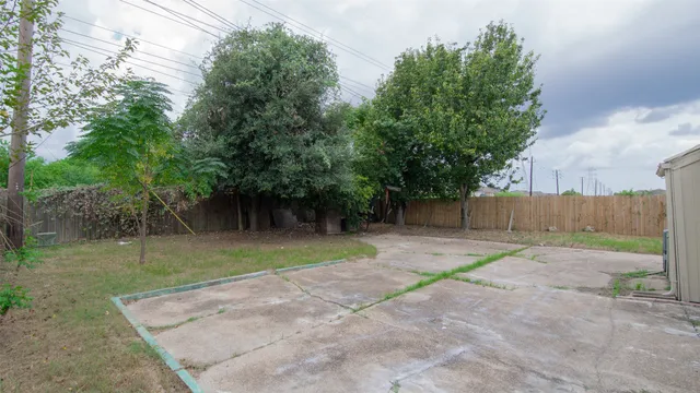 a backyard of a house with trees
