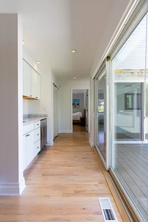 a open kitchen with sink cabinets and refrigerator
