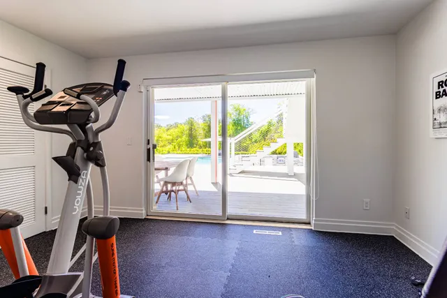 a view of a room with gym equipment
