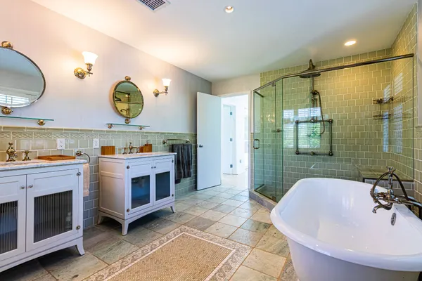 a view of a backyard with sitting area