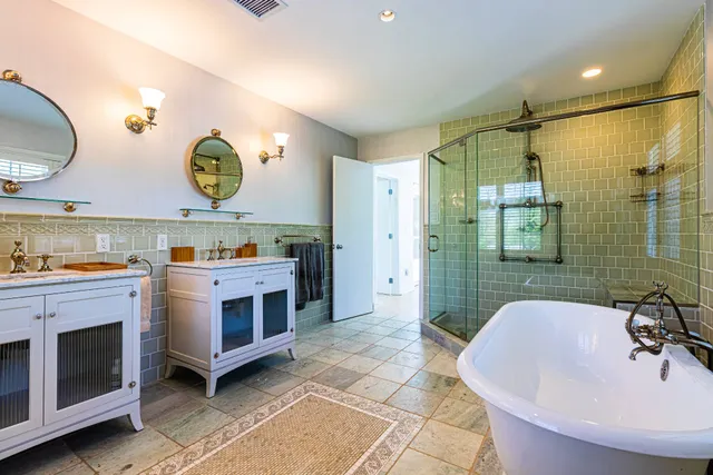 a view of a backyard with sitting area