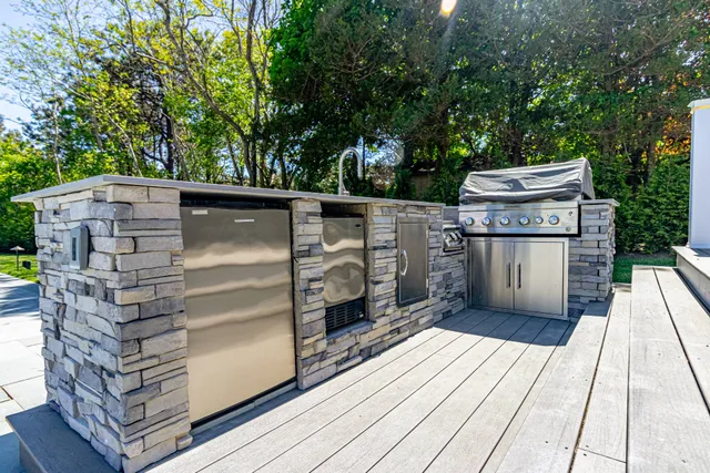 front view of a house with a sink and glass door