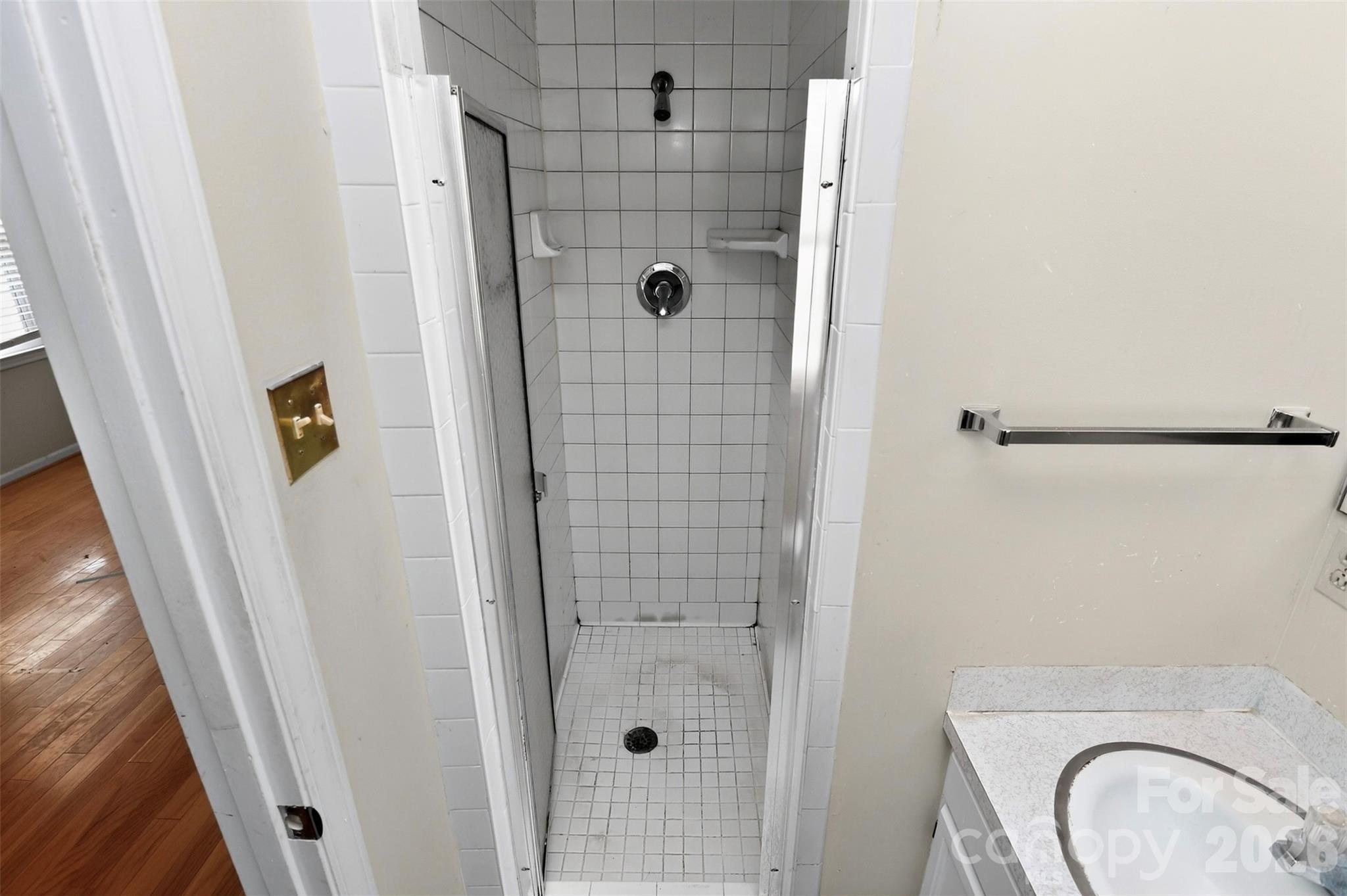 9516 Westmoreland Road Cornelius, NC 28031 - Photo 30 of 40 a bathroom with a shower and toilet
