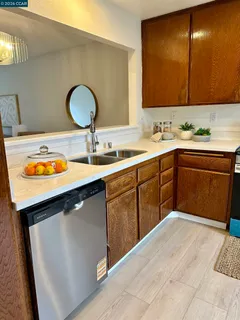 a bathroom with a sink double vanity and a mirror