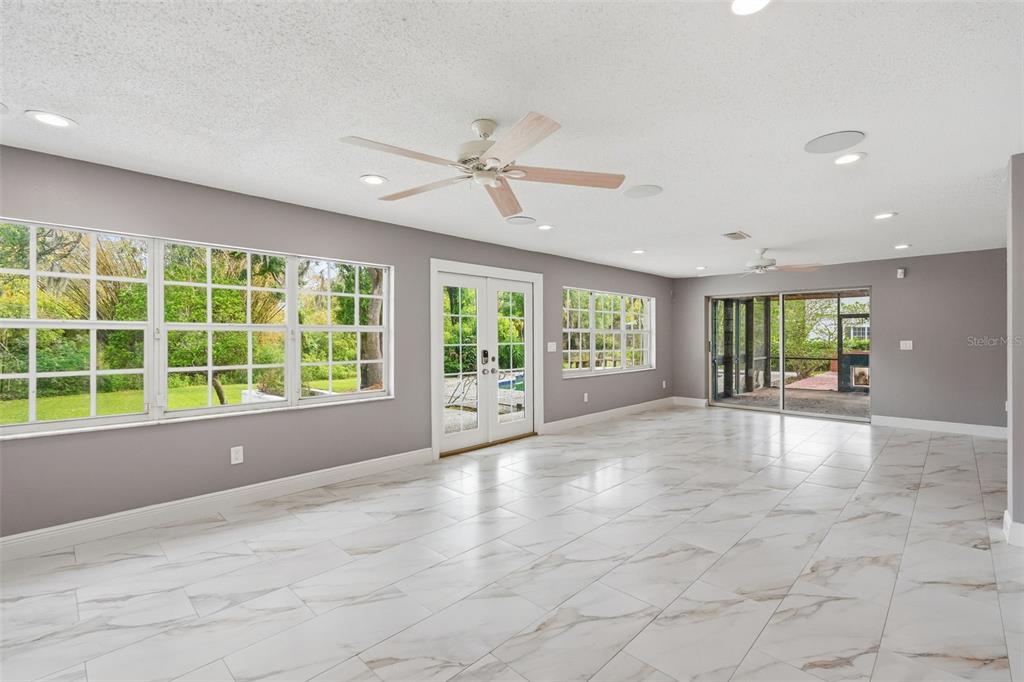 1840 Salem Court Dunedin, FL 34698 - Photo 13 of 64 a view of an empty room with a window