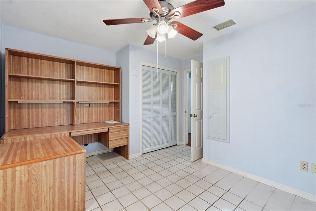 1840 Salem Court Dunedin, FL 34698 - Photo 24 of 64 a view of a livingroom with furniture and window