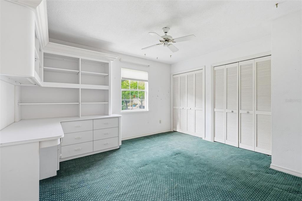 1840 Salem Court Dunedin, FL 34698 - Photo 27 of 64 a view of an empty room with a window
