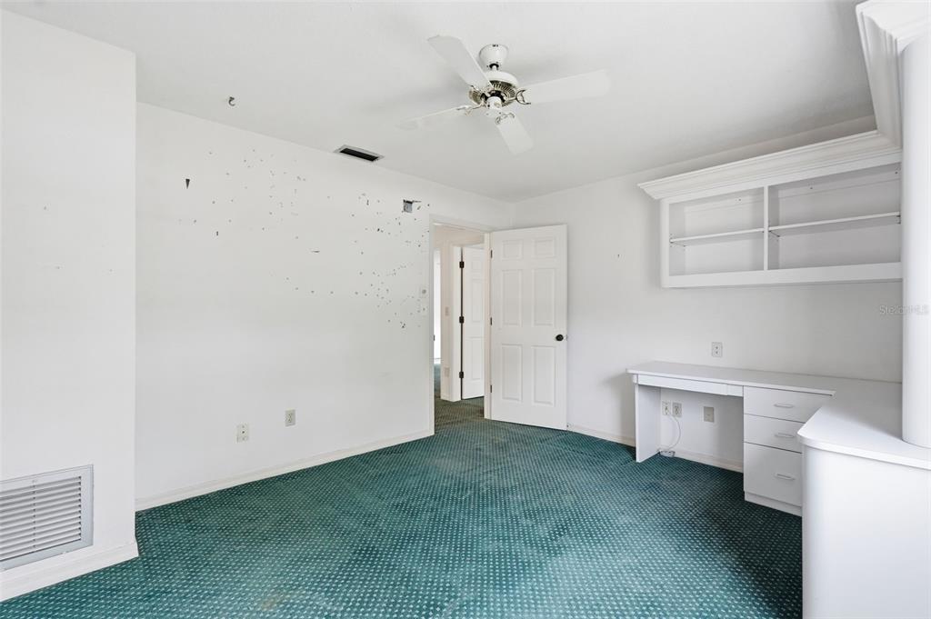 1840 Salem Court Dunedin, FL 34698 - Photo 28 of 64 a view of an empty room with a window