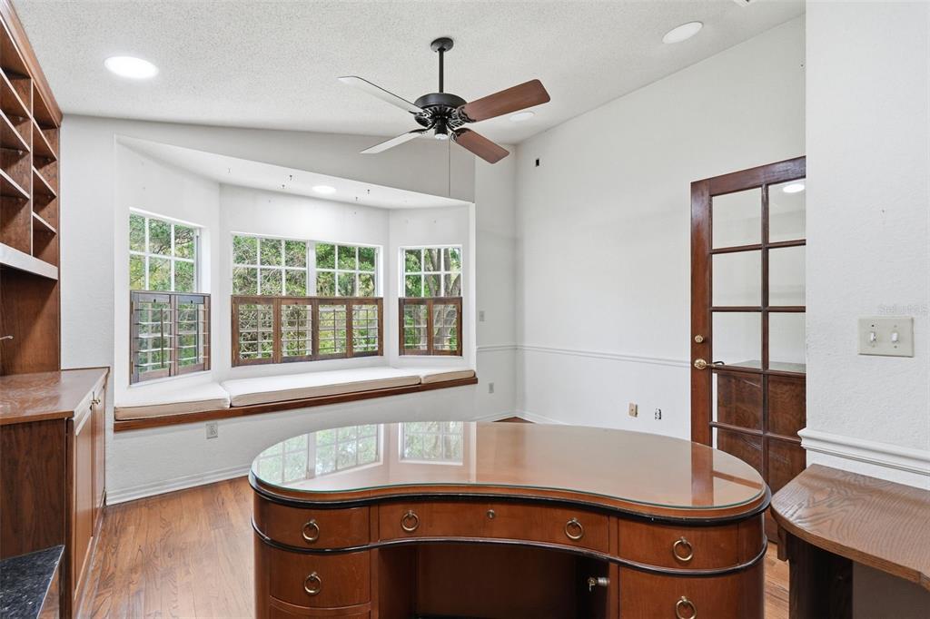 1840 Salem Court Dunedin, FL 34698 - Photo 46 of 64 a room with table and window