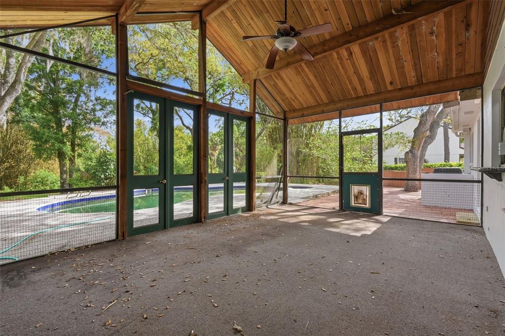 1840 Salem Court Dunedin, FL 34698 - Photo 55 of 64 a view of an empty room with a large window