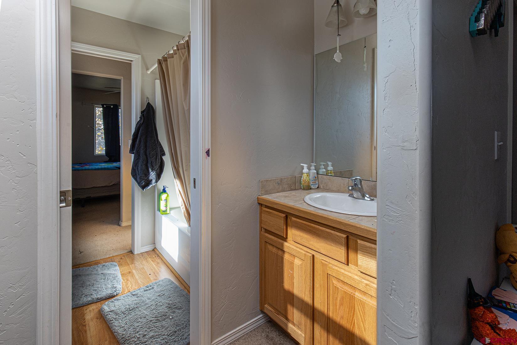 325 Star Crossing, Unit 2 Bayfield, CO 81122 - Photo 16 of 24 a view of bathroom with dual sinks