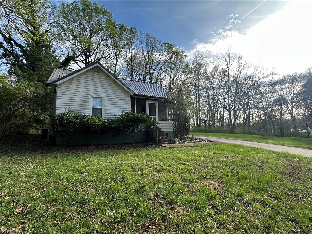174 Sunset Drive Rural Hall, NC 27045 - Photo 1 of 18 Beautiful home with screen porch
