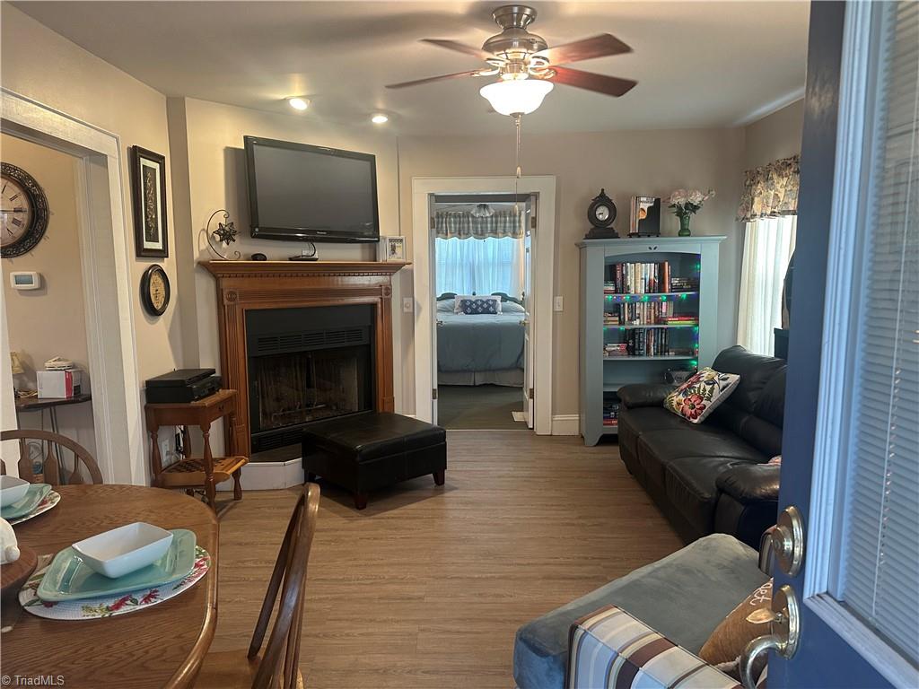 174 Sunset Drive Rural Hall, NC 27045 - Photo 2 of 18 living room with LVP & FP