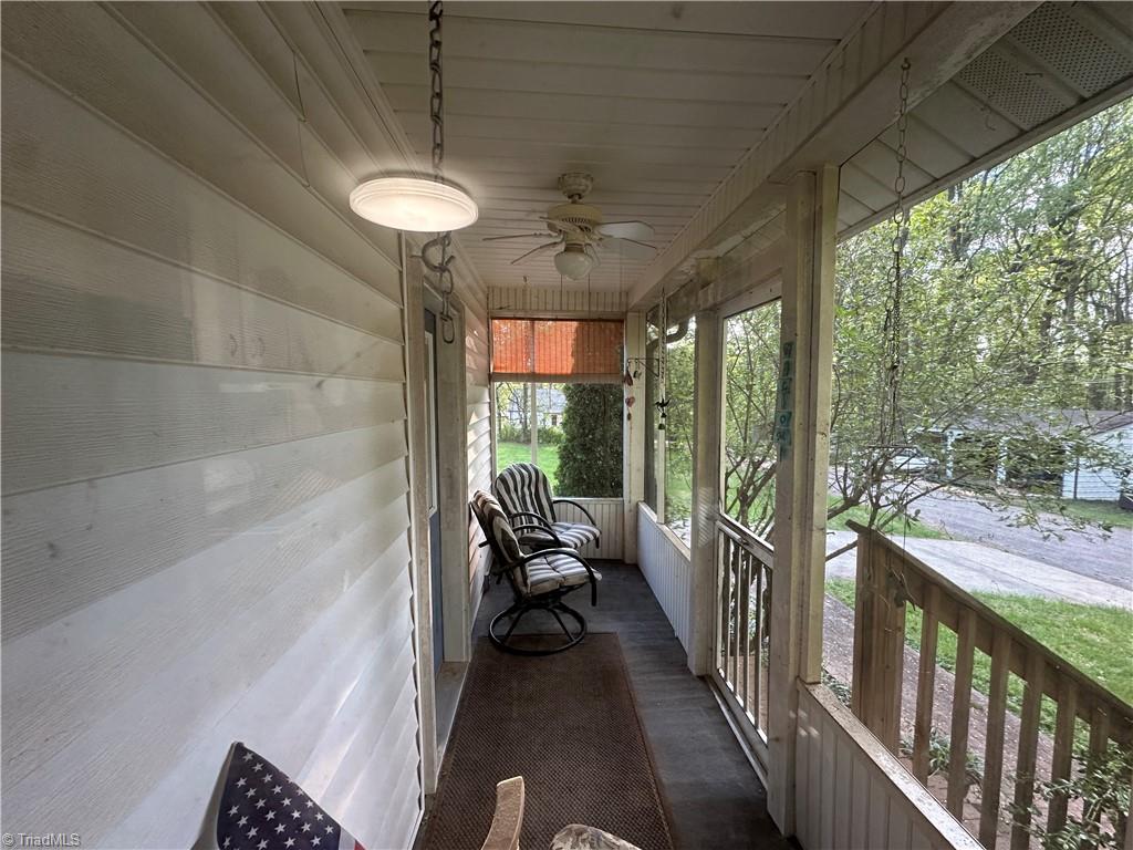 174 Sunset Drive Rural Hall, NC 27045 - Photo 3 of 27 Front screened porch