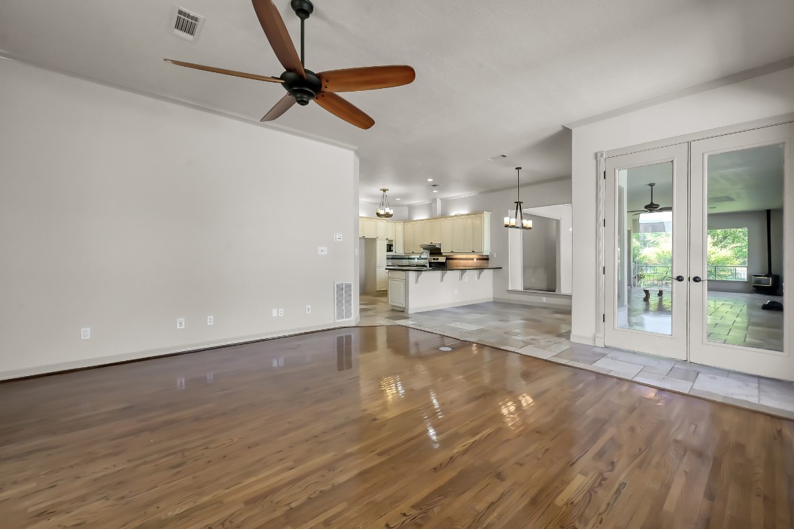12758 Aries Loop Willis, TX 77318 - Photo 12 of 48 a view of empty room with wooden floor and a window