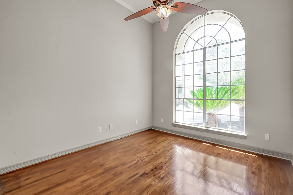 12758 Aries Loop Willis, TX 77318 - Photo 24 of 48 an empty room with a window