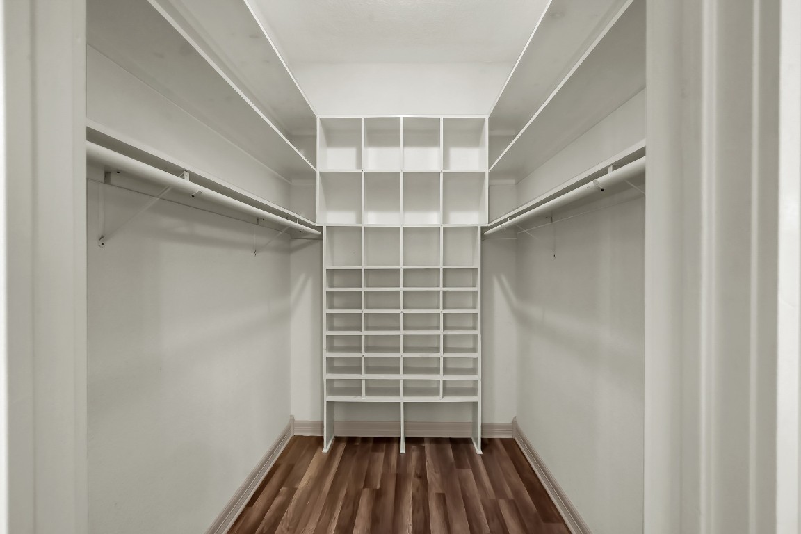 12758 Aries Loop Willis, TX 77318 - Photo 48 of 48 a view of walk in closet with empty racks