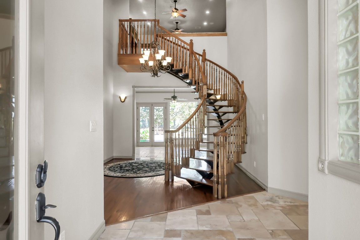 12758 Aries Loop Willis, TX 77318 - Photo 6 of 48 a view of entryway and hall with a front door