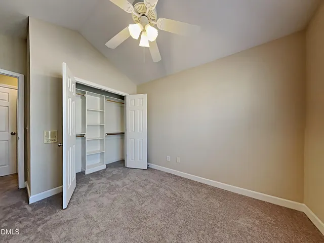 an empty room with a bathroom