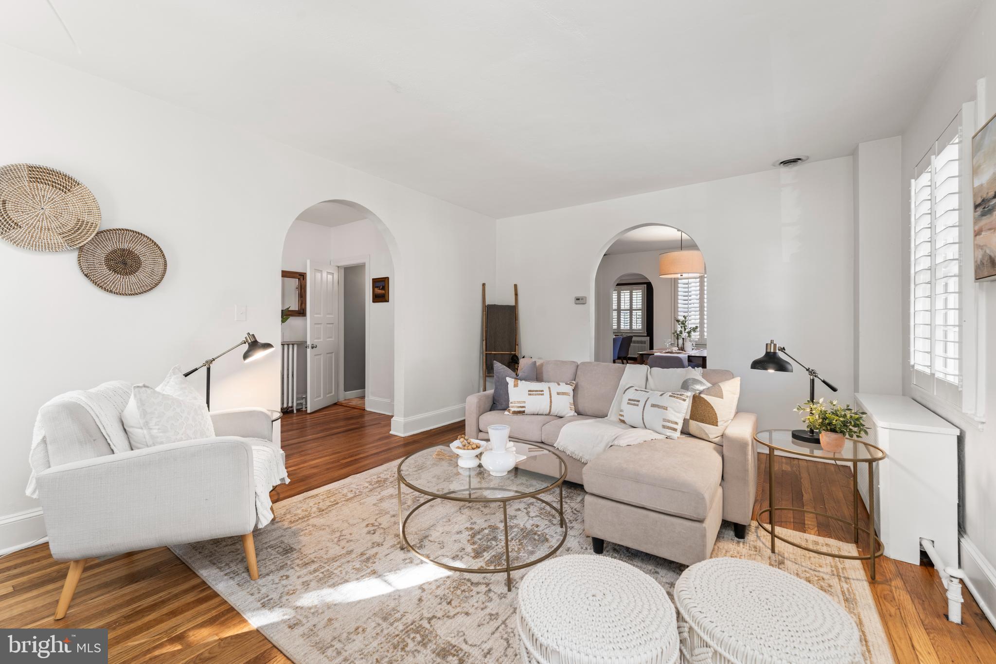 910 Kingston Road Baltimore, MD 21212 - Photo 9 of 36 a living room with furniture and a large window