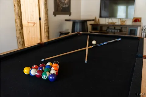 a kitchen with a stove top oven sink and cabinets