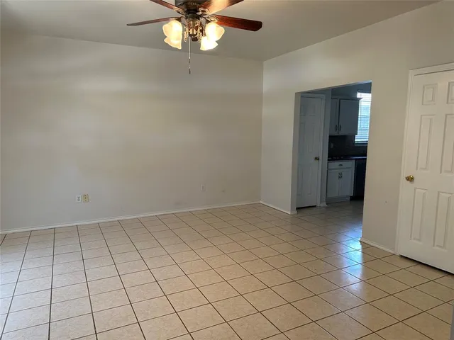 a view of an empty room and window