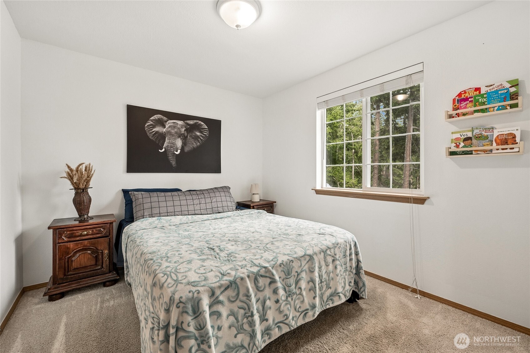 17535 Loop Lane Southeast Yelm, WA 98597 - Photo 20 of 30 a bedroom with a bed and a window