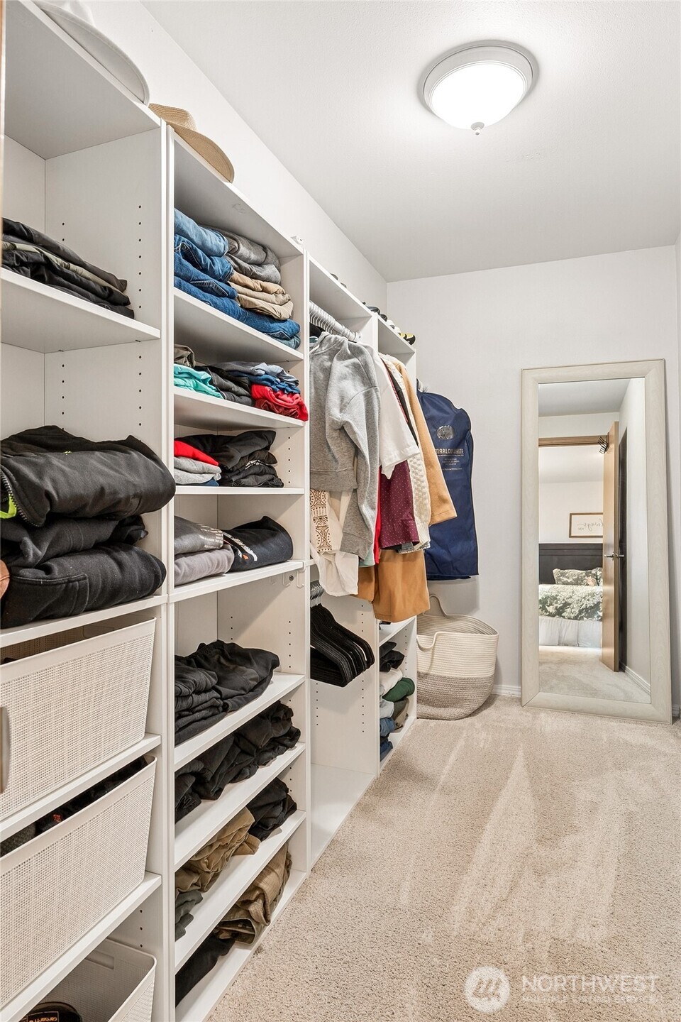17535 Loop Lane Southeast Yelm, WA 98597 - Photo 25 of 30 a view of walk in closet with clothes and shoes