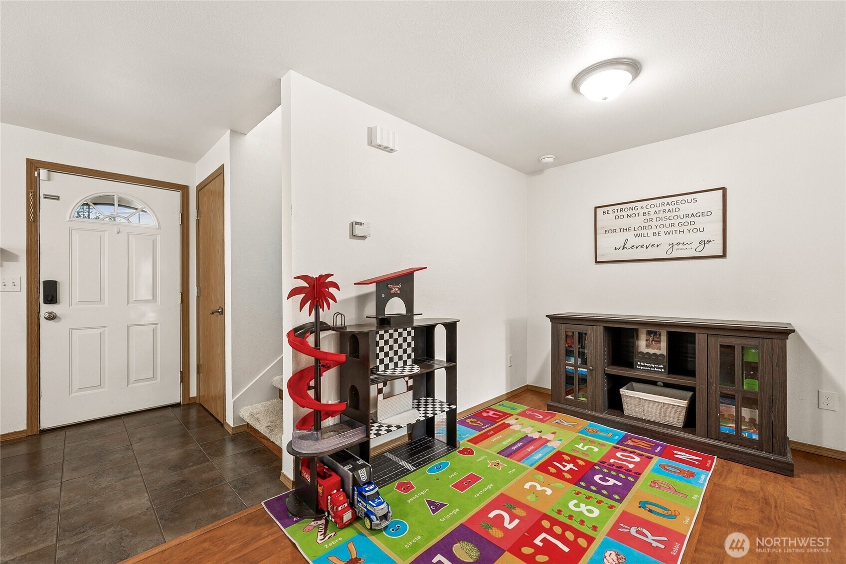 17535 Loop Lane Southeast Yelm, WA 98597 - Photo 8 of 30 a bedroom with a bed and a workspace