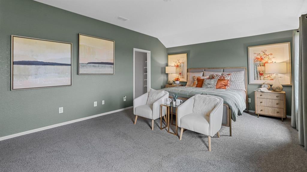 16421 Hudson Pr Way Justin, TX 76247 - Photo 14 of 39 a bedroom with a bed a lamp and window