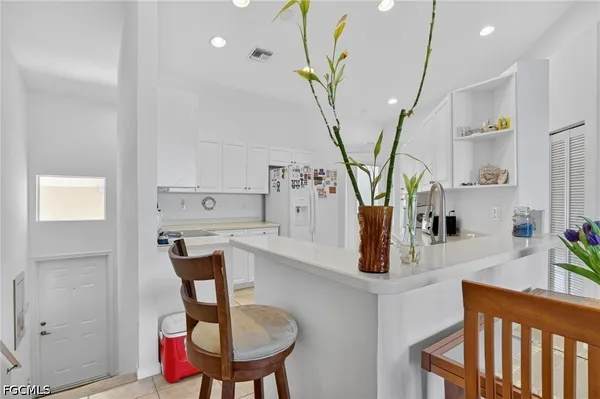 $258,900 | 25009 Peacock Lane, Unit 1201, Naples, FL 34114