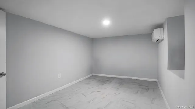 a bathroom with a shower and a toilet