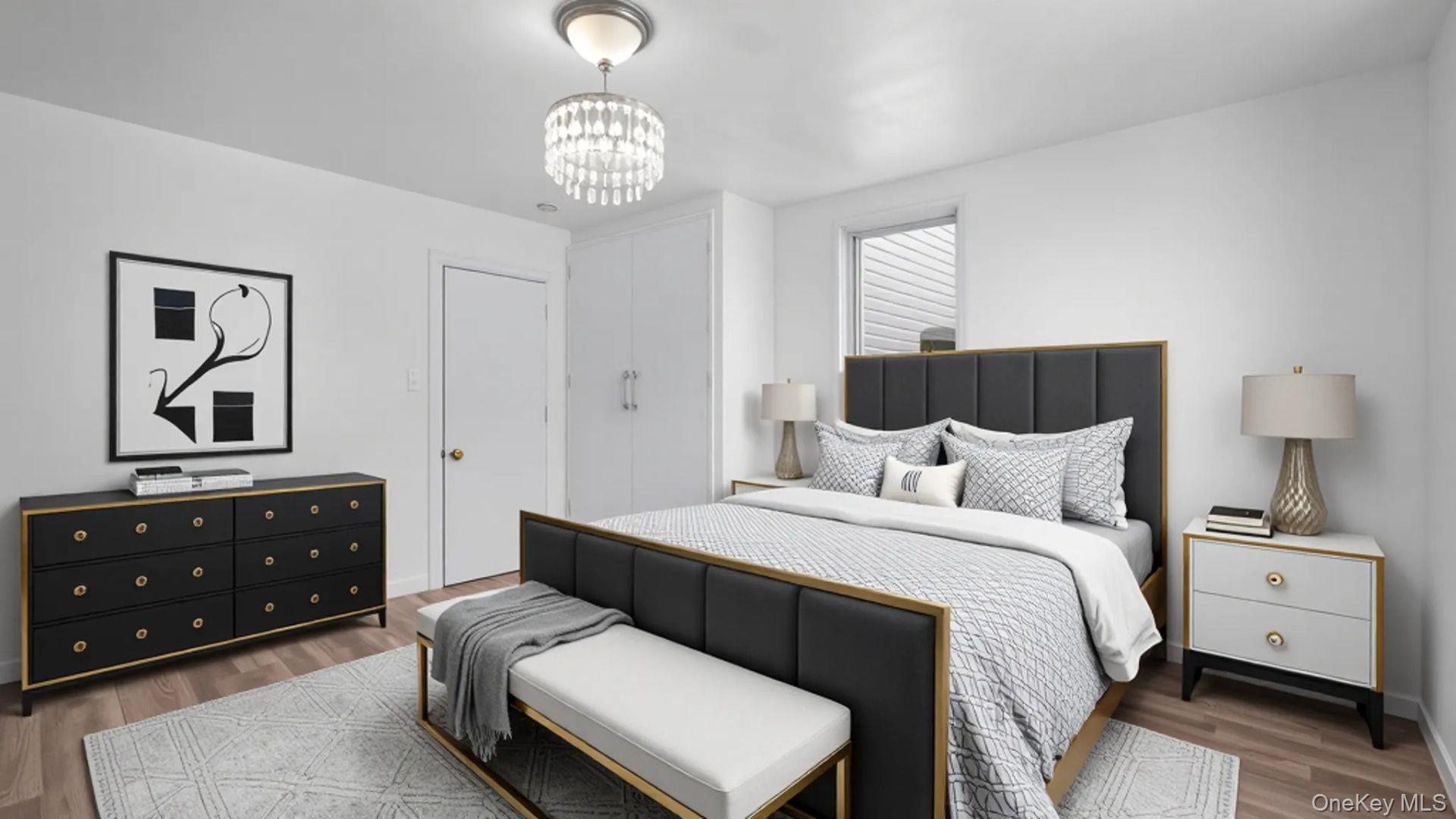 681 Rhinelander Avenue Bronx, NY 10462 - Photo 5 of 30 Bedroom featuring wood finished floors and a chandelier