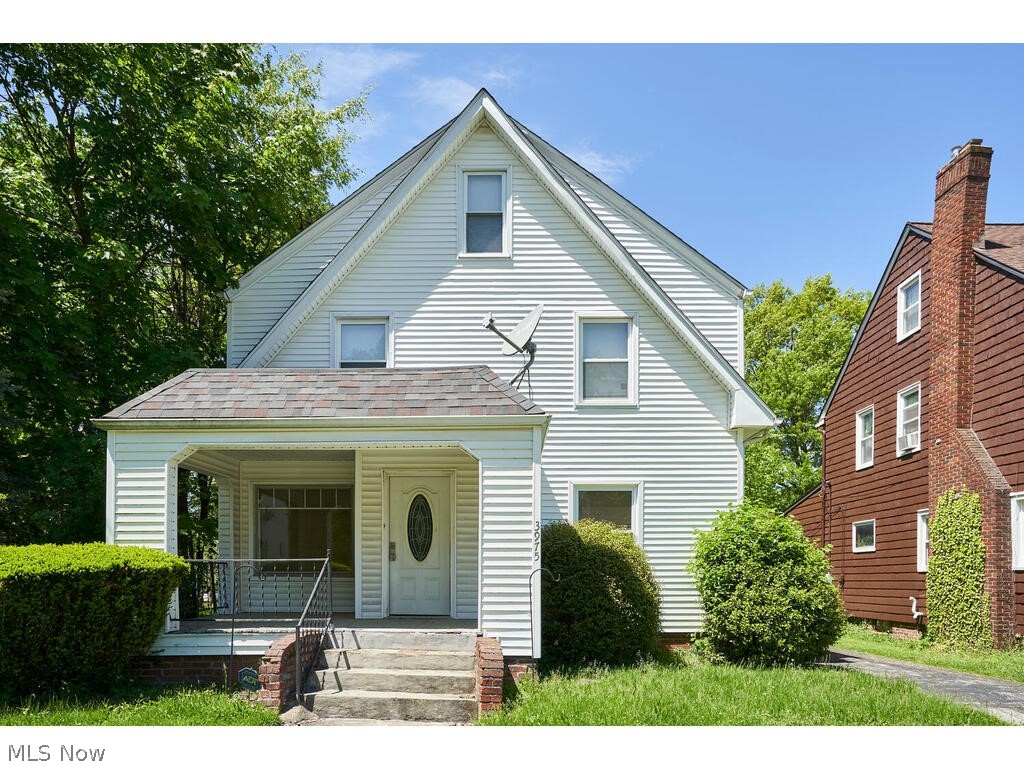 3975 Delmore Road Cleveland Heights, OH 44121 - Photo 2 of 27 View of front of home featuring a porch