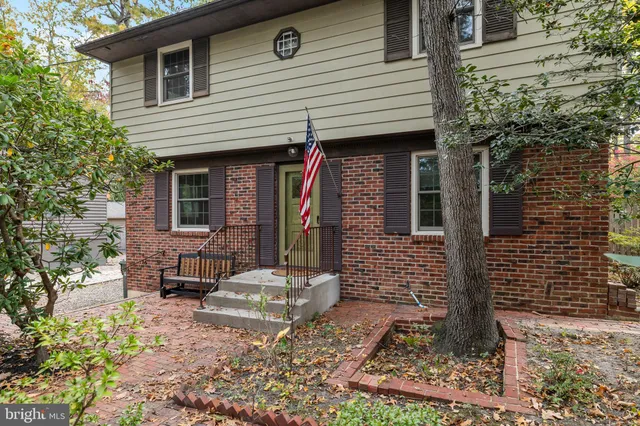 a front view of a house with patio