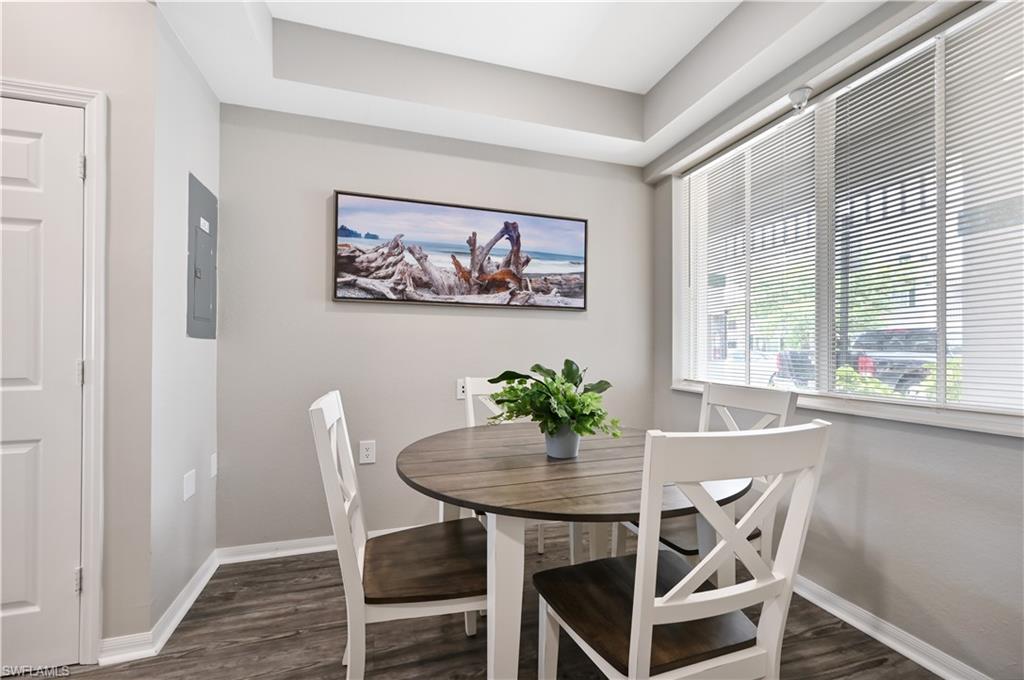 7915 Mahogany Run Lane, Unit 1115 Naples, FL 34113 - Photo 22 of 39 a dining room with furniture and window