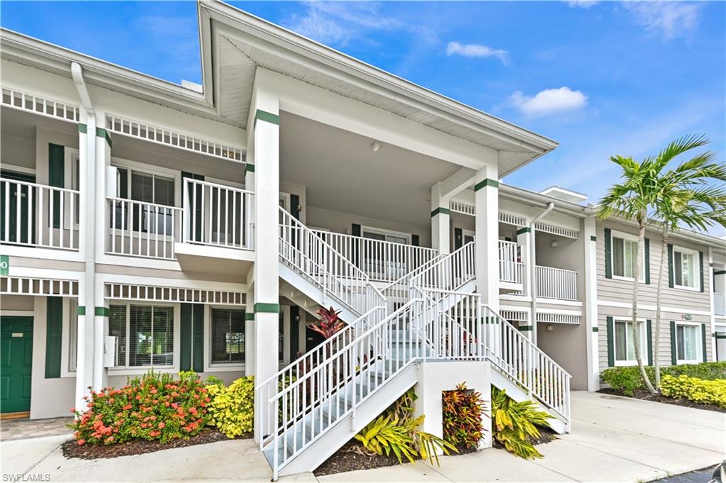 7915 Mahogany Run Lane, Unit 1115 Naples, FL 34113 - Photo 8 of 39 a view of a house with a balcony