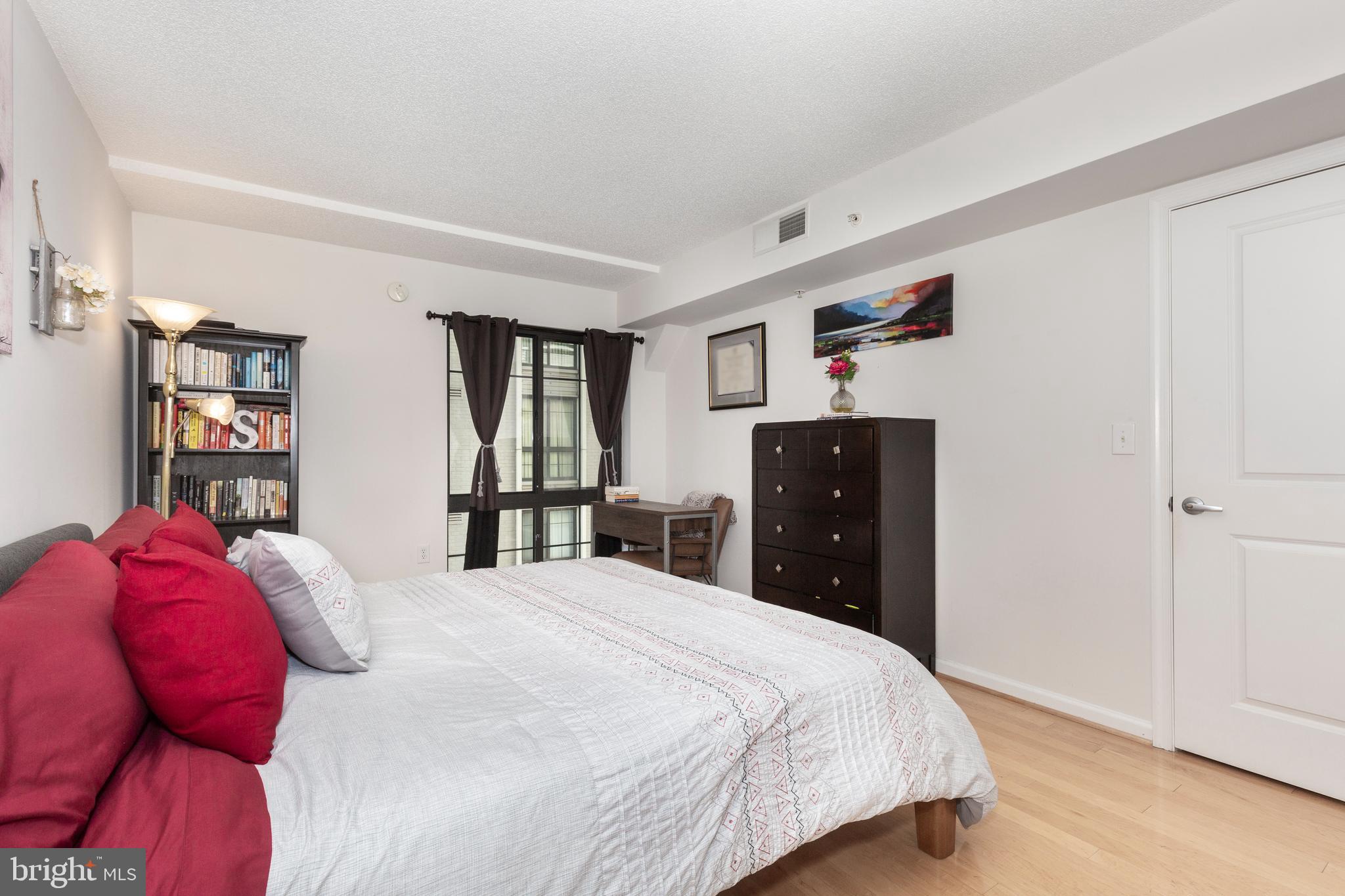 7923 Eastern Avenue Northwest, Unit 704 Silver Spring, MD 20910 - Photo 14 of 33 Primary Bedroom