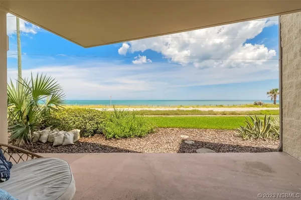 a view of a building and a yard