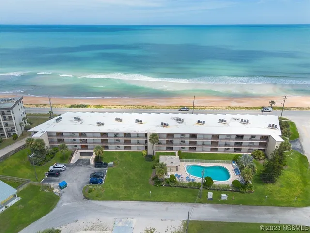 a view of a swimming pool with an outdoor space
