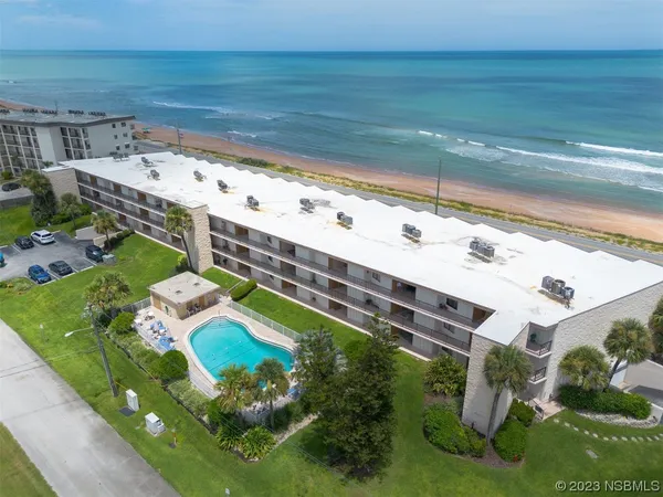 a view of a swimming pool with an outdoor space