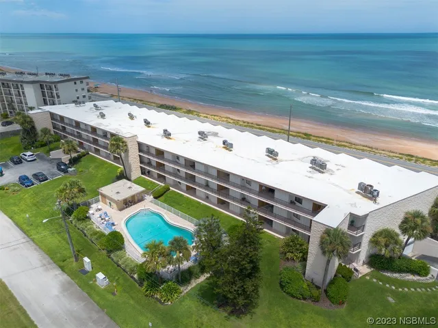 a view of a swimming pool with an outdoor space