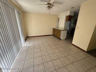 963 Brookview Lane Rockledge, FL 32955 - Photo 5 of 14 an empty room with windows