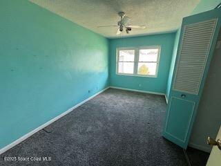 963 Brookview Lane Rockledge, FL 32955 - Photo 7 of 14 a view of room with window and fan