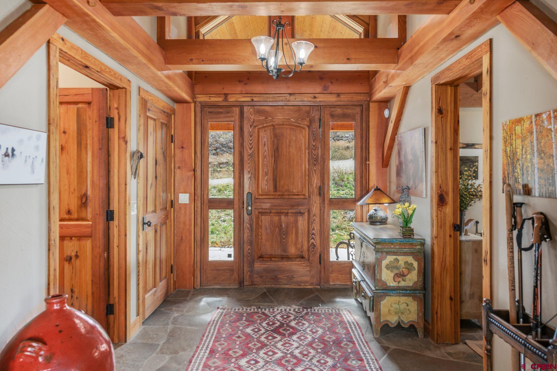 796 Red Mountain Ranch Road Crested Butte, CO 81224 - Photo 16 of 45 a view of an entryway with wooden floor
