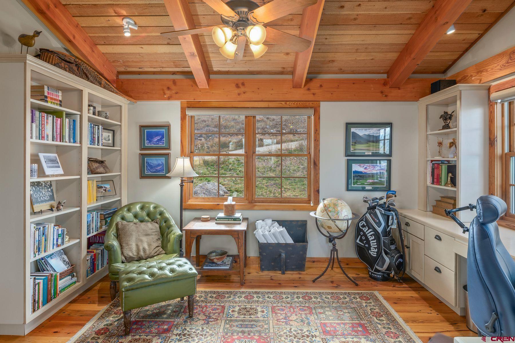 796 Red Mountain Ranch Road Crested Butte, CO 81224 - Photo 20 of 45 a living room with furniture a rug and a large window