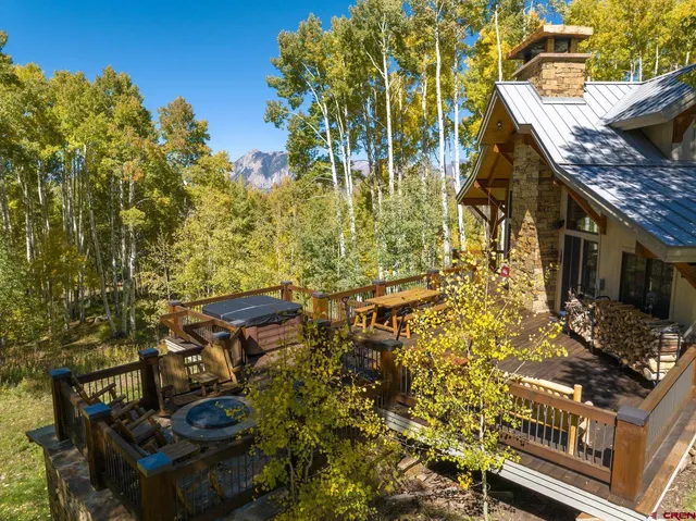 an aerial view of a house with swimming pool