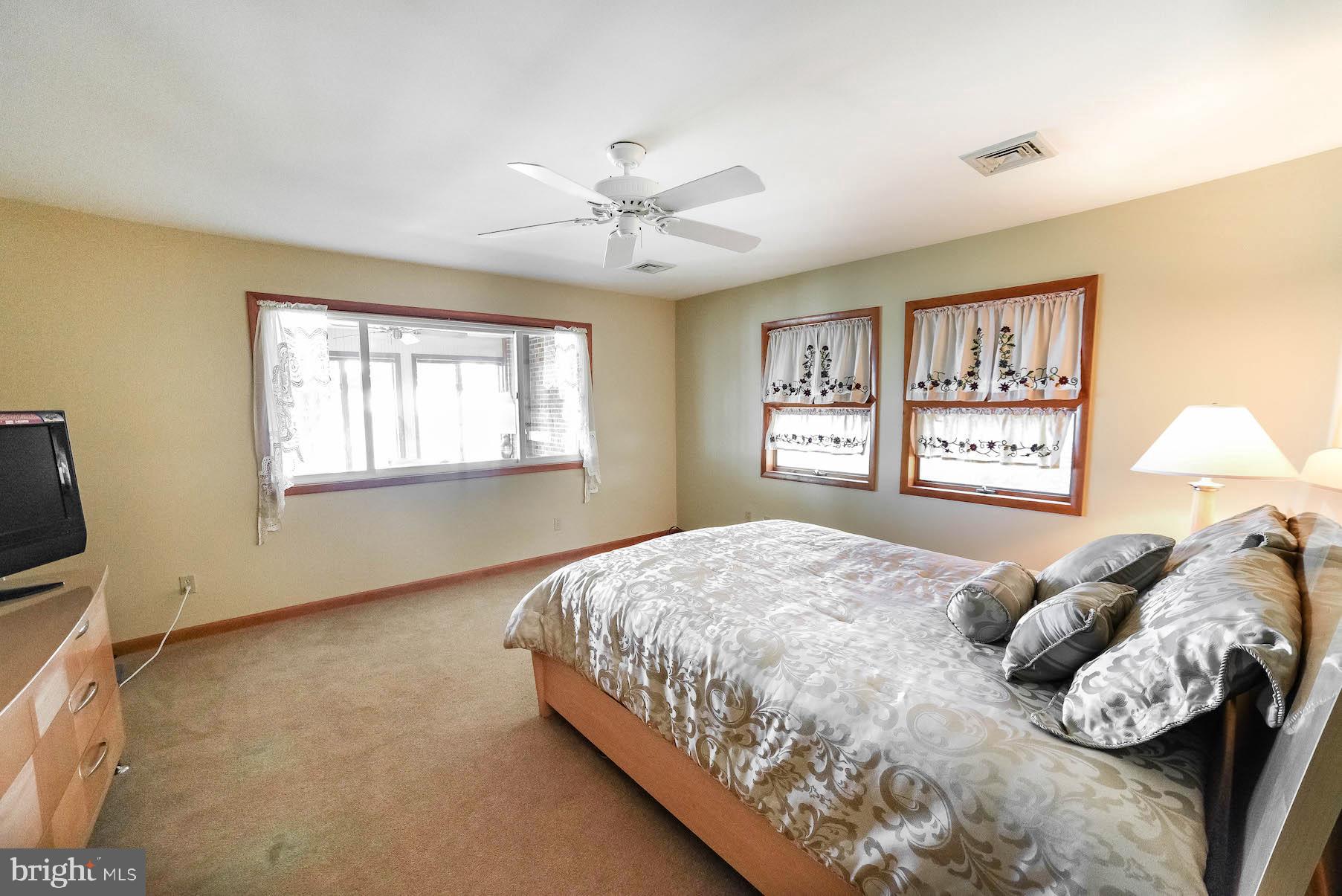 18265 River Road Tall Timbers, MD 20690 - Photo 29 of 32 Master bedroom with water view