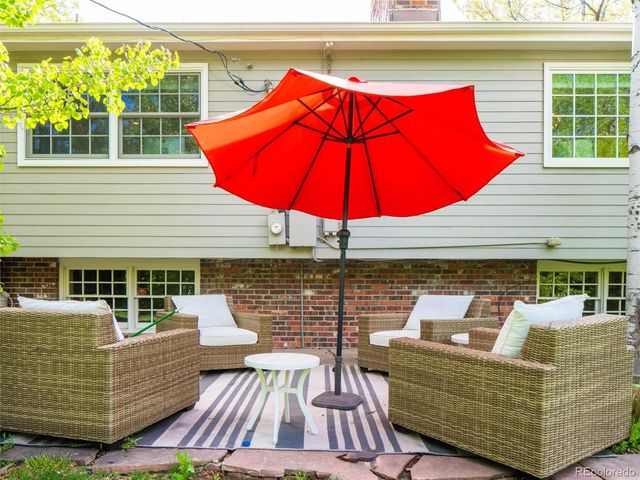a view of a park with large trees
